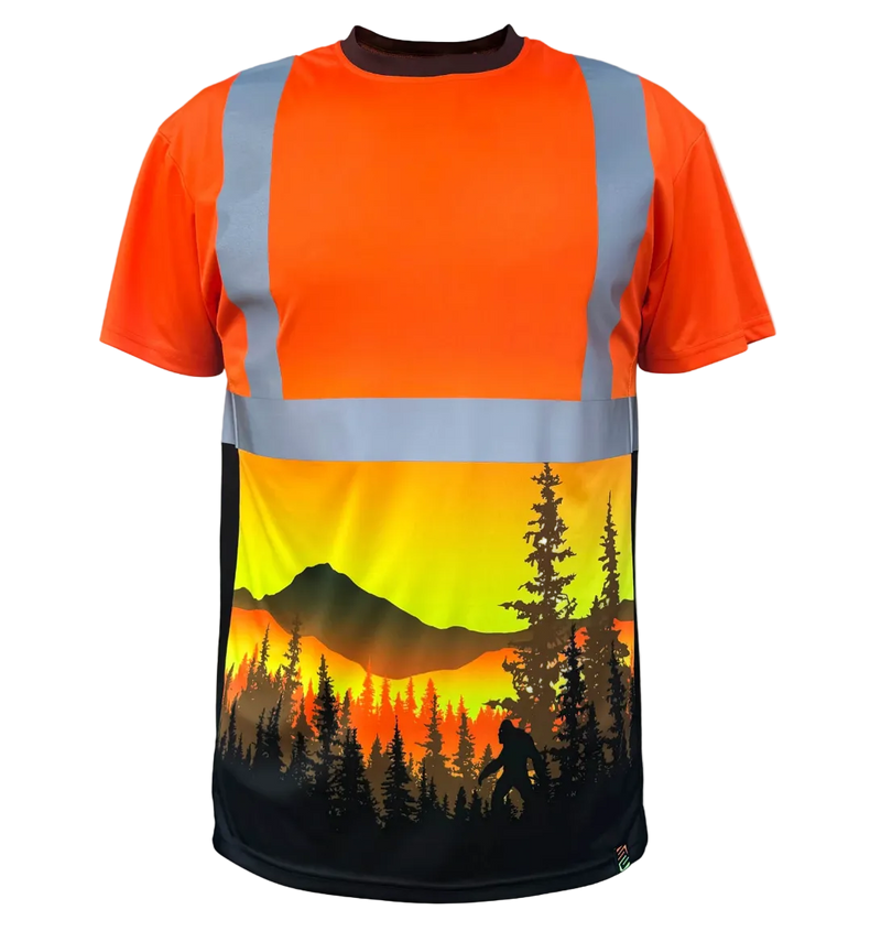 Load image into Gallery viewer, A short-sleeve high-visibility safety shirt with reflective silver-gray stripes on an orange body, featuring a large scenic graphic print of a mountain and pine forest sunset on the lower half.
